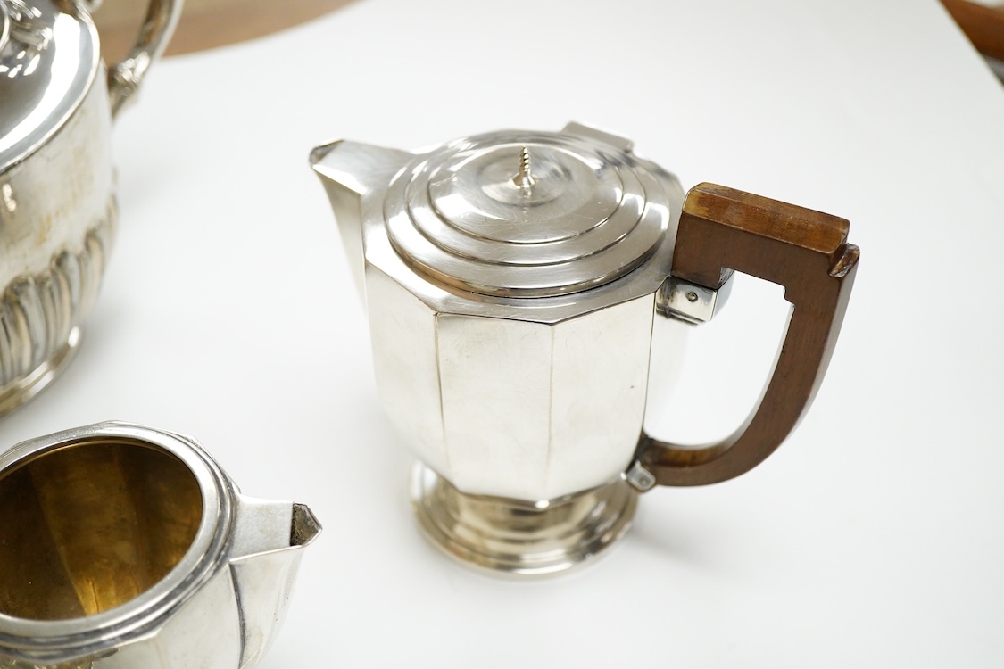A 20th century continental 800 standard white metal hot water pot and cream jug (lacking cover and knop), gross weight 11.2oz, together with a plated teapot, sauceboat and bowl.